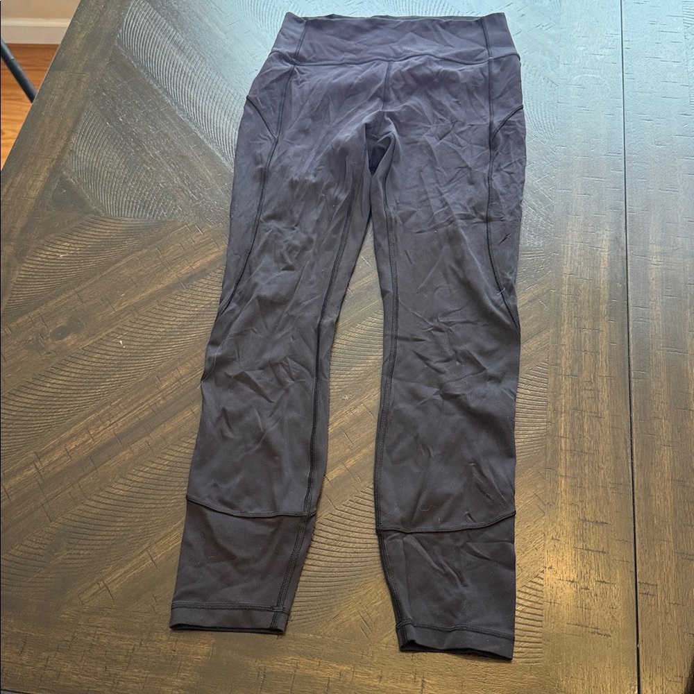 Lululemon 25” Black Leggings with stitching detail - Size 6
